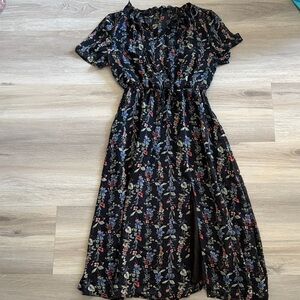 Floral blue Dress. Lining of dress has tear. See pictures